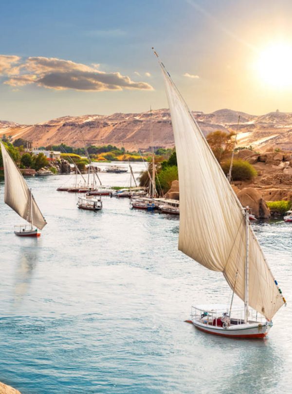 Traditional,Nile,Sailboats,Near,The,Banks,Of,Aswan,,Egypt
